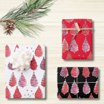 Christmas Trees Red Black White Wrapping Paper Sheet<br><div class="desc">This cute Christmas wrapping paper is decorated with whimsical watercolor Christmas Trees in shades of red and purple on white,  red or black backgrounds.
Because we create our own artwork you won't find this exact image from other designers.
Original Watercolor © Michele Davies.</div>