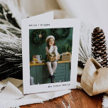 Christmas Typewriter | Black and White with Photos Holiday Card<br><div class="desc">These simple and minimalist folded Christmas holiday cards feature two of your favourite personal family photos, along with your names and the words "merry bright" in black typewriter look text. You can change this to any greeting of your choice, and there is room for a short personal message inside the...</div>