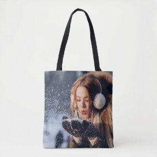 Christmas Winter Girl blowing snow in Her Hand Tote Bag