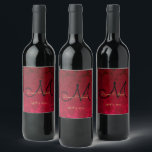 Christmas Winter Red Gold Black Wedding Monogram Wine Label<br><div class="desc">Christmas winter red gold black wedding reception favours. Floral monogram pattern custom wine bottle labels. Chic,  elegant,  modern,  trendy,  classy,  stylish,  beautiful succulent metallic. Image copyright Marg Seregelyi Photography.</div>