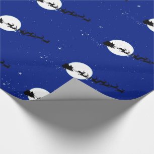 Christmas wrapping paper with reindeer and a moon