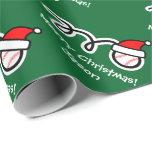 Christmas wrapping paper with Santa hat baseball<br><div class="desc">Merry Christmas wrapping paper with Santa hat baseball. Cute Holiday design for players and fans. Funny Xmas gift wrap for men,  women and kids (boys and girls). Personalizable with custom name and greeting. Green and red colours. Background colour is customizable.</div>