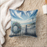 Christmas Wreath On a Beach Fence Throw Pillow<br><div class="desc">A wreath decorated with seashells and greenery adorns a wooden fence,  while a lighthouse stands near the ocean under a sky filled with dramatic clouds and soaring seagulls</div>