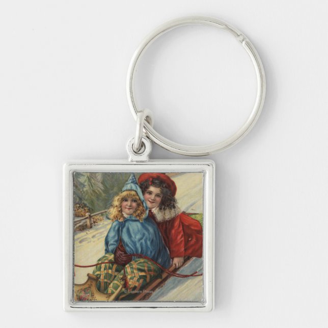 ChristmasTwo Little Girls Sledding Keychain (Front)