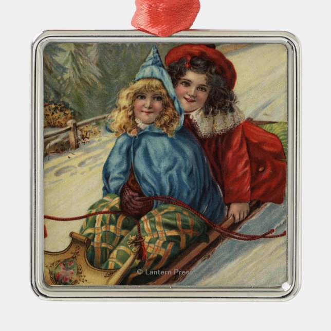 ChristmasTwo Little Girls Sledding Metal Ornament (Front)