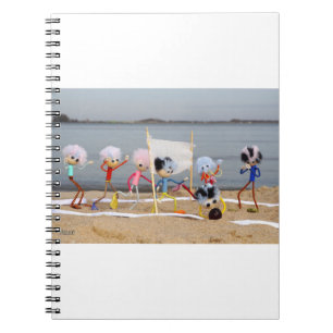 Chubby dolls playing beach volleyball. notebook