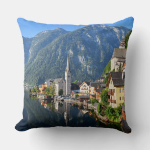 Church and village of Hallstatt, Austria with Alps Throw Pillow