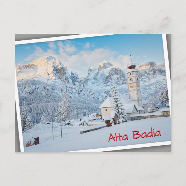 Church covered in snow with mountain background postcard (Front)