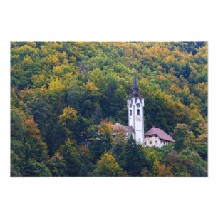 Church in a fall forest in Slovenia Photo Print