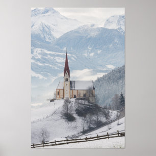 Church in an alpine winter landscape poster