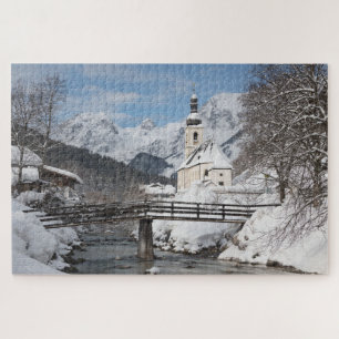 Church in the snow with Alps mountains in winter Jigsaw Puzzle
