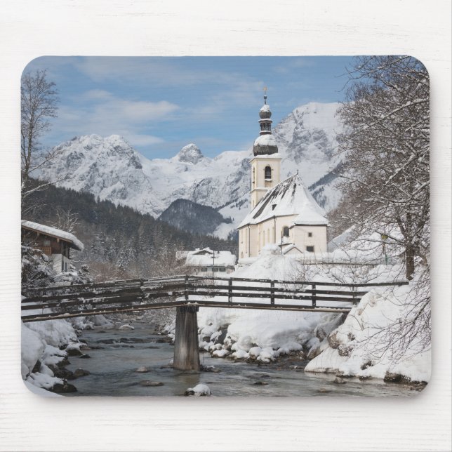 Church in the snow with Alps mountains in winter Mouse Pad (Front)