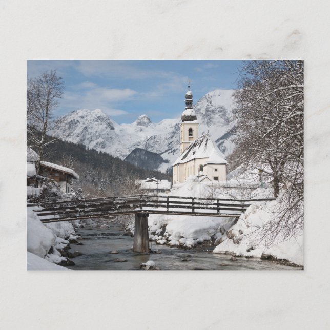 Church in the snow with Alps mountains in winter Postcard (Front)