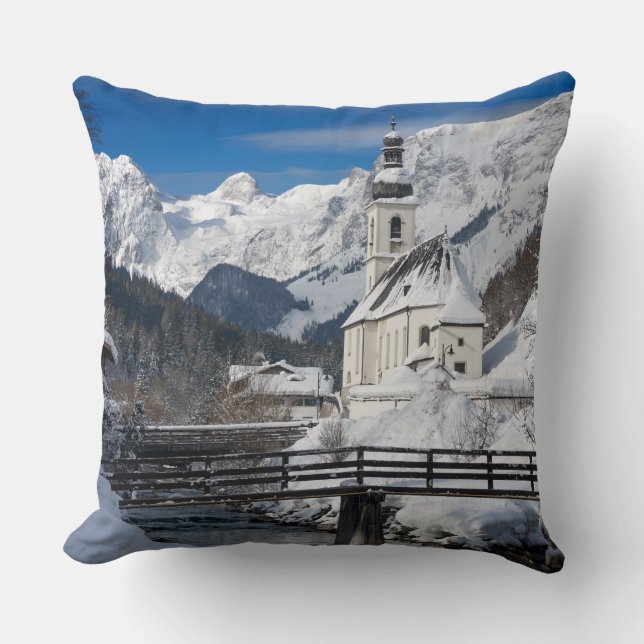 Church in the snow with Alps mountains Throw Pillow (Front)
