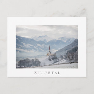 Church in Zillertal in winter white text postcard