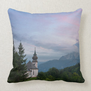 Church with Alps mountains at sunset Throw Pillow