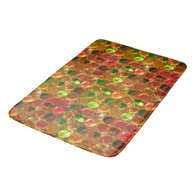 Circle of texture on rough orange bath mat (Angled)