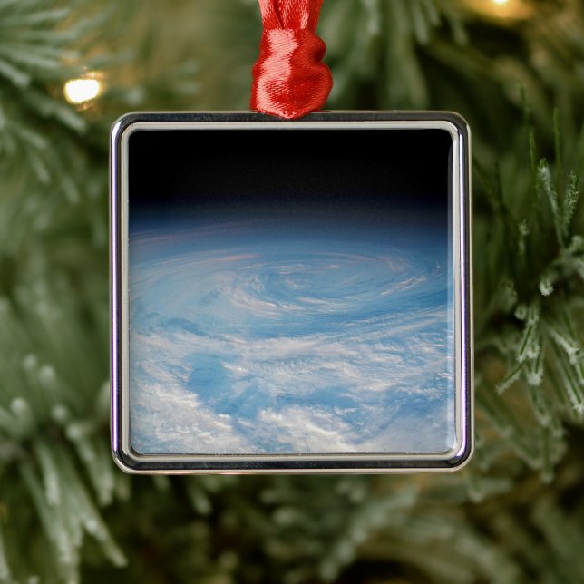 Circular Cloud Formation Over South Pacific Ocean. Metal Ornament (Tree)