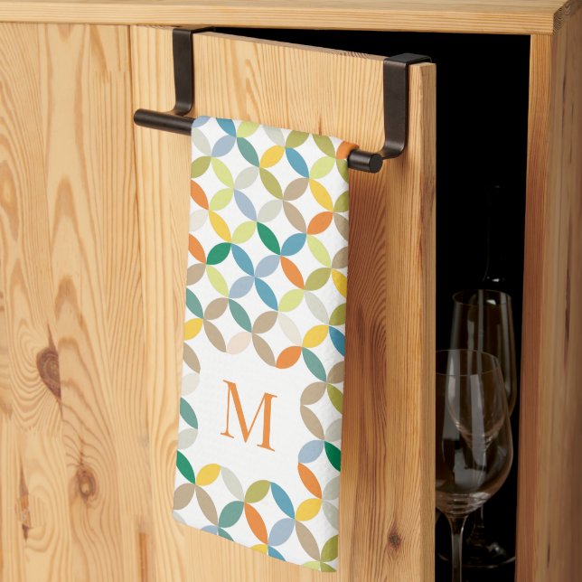 Circular quartered pattern warm tone monogram kitchen towel (Thirds Fold)