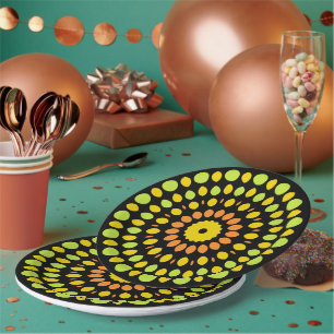 Citrus colours on black background, paper plate
