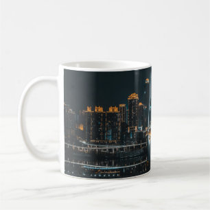 CITY BUILDINGS DURING NIGHT TIME COFFEE MUG