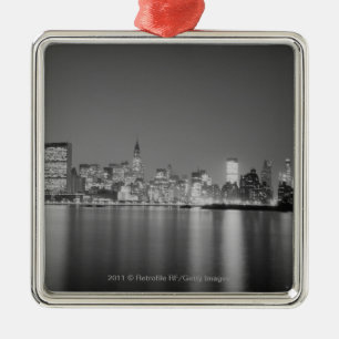 City skyline at night metal ornament