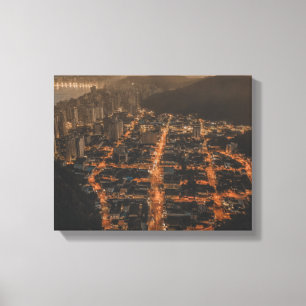 cityscape during night time canvas print