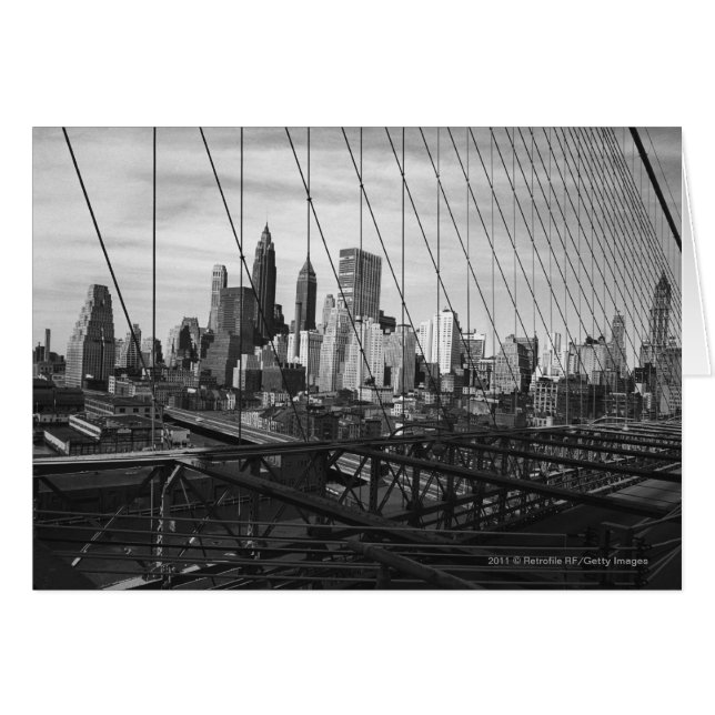 Cityscape through bridge cables (Front Horizontal)