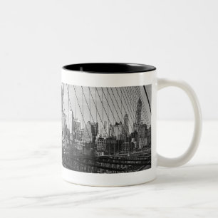 Cityscape through bridge cables Two-Tone coffee mug