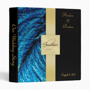 Classeur bleu de ruban de monogramme d'or de plume