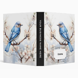 Classeur Bleu printanier dans l'arbre florissant