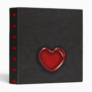 Classeur Coeur métallique rouge sur le cuir noir
