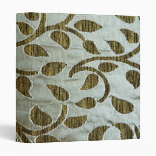 Classeur Feuille vert sur le tissu argenté