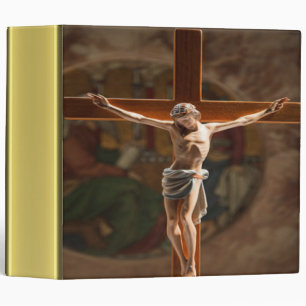 Classeur Jésus sur la texture croisée de feuille d'or