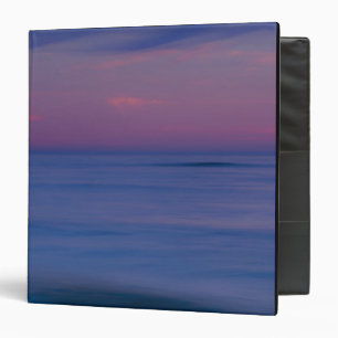Classeur Lever du soleil violet sur le rivage de l'océan