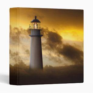 Classeur Phare rougeoyant sous le ciel dramatique