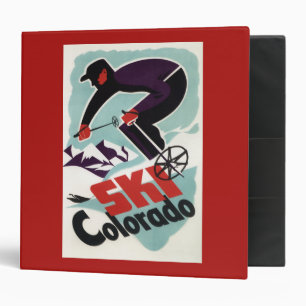 Classeur Skieur noir et par pourpre vêtu
