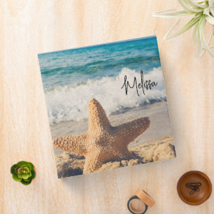 Classeur Starfish sur une plage de sable Photo