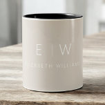 Classic Beige Taupe Neutral Minimalist Monogram Two-Tone Coffee Mug<br><div class="desc">Start your day with this classic beige taupe neutral minimalist monogram two-tone coffee mug. Featuring a soft beige taupe background, clean black typography, and a simple modern layout, this personalized mug blends understated elegance with everyday functionality. Perfect for weddings, anniversaries, corporate gifts, or anyone who loves chic neutral drinkware. Customize...</div>