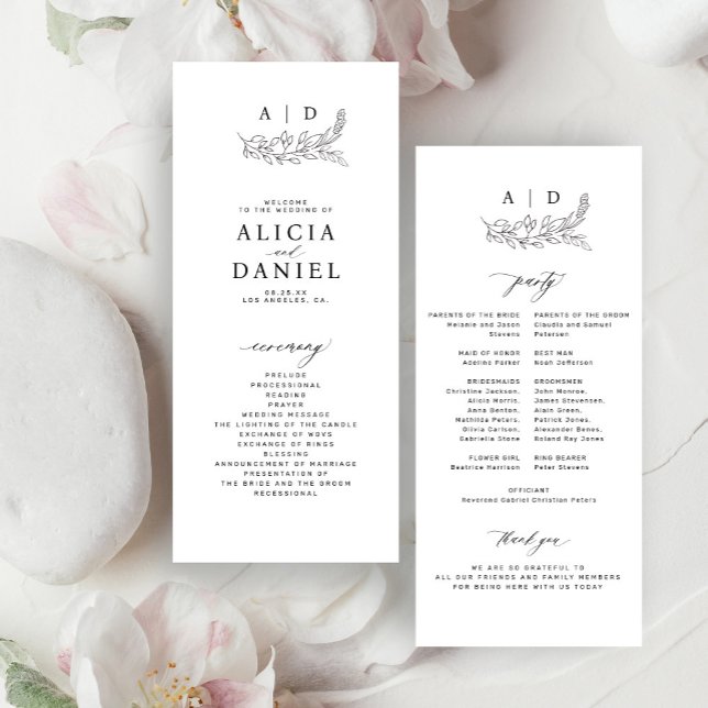 Classic black and white monogram wedding program (Creator Uploaded)