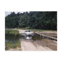 Classic Car Driving Through Water in a Park