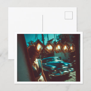 Classic Cuban car, woman walking past lamps Postcard