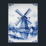 Classic Delft Blue Windmill Canal Scene Postcard<br><div class="desc">Evoke the timeless charm of the Netherlands with this iconic Delft blue porcelain-inspired design. A traditional Dutch windmill stands proudly beside a serene canal, complete with a drawbridge, quaint house, and lush foliage, all rendered in rich cobalt blue on a crisp white background. Delicate floral borders frame the scene, adding...</div>