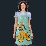 Classic Happy Pluto Apron<br><div class="desc">Celebrate a sense of timeless fun with this charming and cheerful Pluto illustration! Featuring a classic, clean art style with bold linework and a sunny yellow palette, this design captures a moment of pure, wagging-tail happiness. With his bright expression and iconic green collar, this friendly pup brings a sense of...</div>