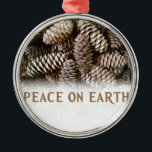 Classic Holiday Pine Cone Peace On Earth Metal Ornament<br><div class="desc">Festive,  earthy pine cones set off this classic,  elegant design wishing Peace On Earth.</div>