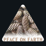 Classic Holiday Pine Cone Peace On Earth Triangle Sticker<br><div class="desc">Festive,  earthy pine cones set off this classic,  elegant design wishing Peace On Earth.</div>