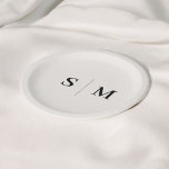 Classic Ivory Monogram Wedding Paper Plate<br><div class="desc">Enhance your wedding decor with these custom paper plates, featuring the couple’s monogram beautifully centred in an elegant serif font. The earthy beige ivory tone adds a refined, natural touch, making these plates ideal for both elegant and rustic-themed weddings. Perfect for cocktail hours, receptions, or casual wedding celebrations, these personalized...</div>