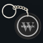 Classic Monogram: Personalized Black, White, and G Keychain<br><div class="desc">Introducing our "Classic Monogram" Keychain – a perfect blend of elegance and functionality. This sophisticated accessory is designed for those who appreciate a classic style with a personal touch. Its elegant black, white, and grey colour scheme exudes a timeless sophistication that complements any set of keys. Personalize this keychain with...</div>
