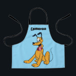 Classic Pluto Red Collar Apron<br><div class="desc">Bring home the world’s most famous pup! This vibrant artwork features Pluto, Mickey Mouse’s loyal and lovable companion, in his iconic happy-go-lucky pose. With his cheerful expression, wagging tail, and signature red collar, this design captures the timeless charm of classic animation. The clean lines and bold colors make this graphic...</div>