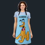 Classic Pluto Red Collar Apron<br><div class="desc">Bring home the world’s most famous pup! This vibrant artwork features Pluto, Mickey Mouse’s loyal and lovable companion, in his iconic happy-go-lucky pose. With his cheerful expression, wagging tail, and signature red collar, this design captures the timeless charm of classic animation. The clean lines and bold colors make this graphic...</div>